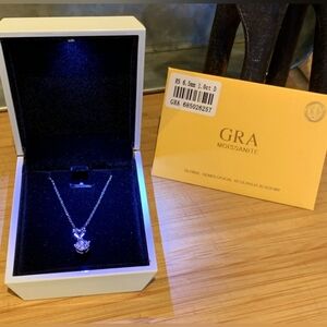 1 CT. MOISSANITE SET IN .925 STERLING SILVER W/CERTIFICATION & LIGHTED BOX